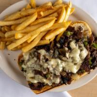 Philly Style Cheese Steak Sandwich · Thinly sliced beef mixed with grilled onions, mushrooms, bell peppers, and Swiss cheese.