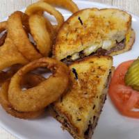 Patty Melt · Rye bread, grilled onions, and melted cheese.