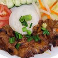 Grilled Pork or Chicken w/ rice (Com thit nuong) · Grilled marinated with lemon grass sliced pork or boneless and skinless chicken leg with hon...