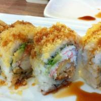 Crunchy Roll · Shrimp tempura, crab, avocado, cream cheese; topped tempura flakes.