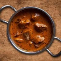 Lamb Tikka Masala · Lamb marinated in a blend of yogurt and mild tandoori spices, then baked in clay oven and co...