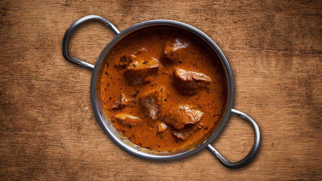 Lamb Tikka Masala · Lamb marinated in a blend of yogurt and mild tandoori spices, then baked in clay oven and cooked with fresh mint leaves, cream, cashew paste and our chefâs special masala sauce.