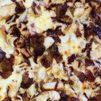 11. Porky's · BBQ sauce, chicken, red onion, bacon.