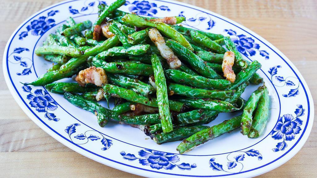 Blistered Green Beans · My mother’s original recipe: tender beans tossed in home-made prik khing curry paste with smoked bacon. Can be made without bacon.