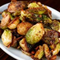 Brussel Sprouts in Bean Sauce (Phat Pak Talat Fai Dang) · Wok-tossed with fermented yellow bean, garlic and Thai chilies. A common, simple preparation...