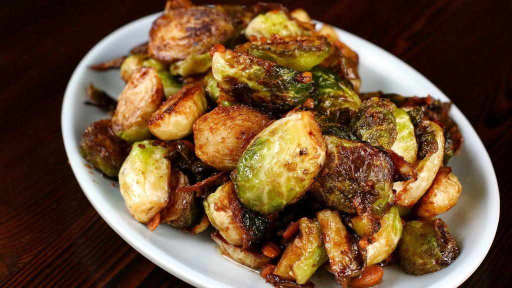 Brussel Sprouts in Bean Sauce (Phat Pak Talat Fai Dang) · Wok-tossed with fermented yellow bean, garlic and Thai chilies. A common, simple preparation of vegetables found at street vendors and in shop houses throughout Thailand and Laos.