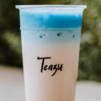 Day N Nite · Jasmine milk tea topped with Boba & Butterfly Pea Tea.
