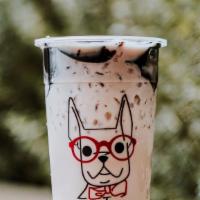Ooolong · Roasted oolong milk tea topped with grass jelly.