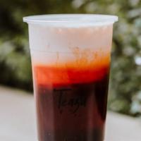 21. Thaiger · Thai tea infused with fresh milk topped with boba.
