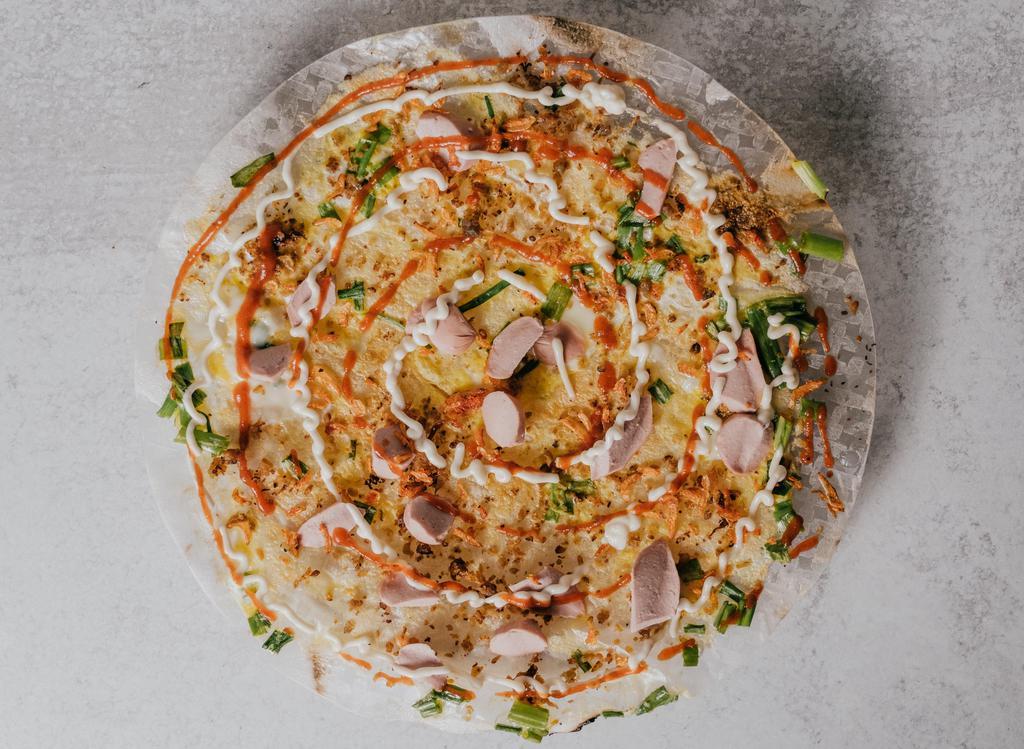 Bánh Trâng Nướng · Grilled Rice Paper Pancake topped with Sausages, Green Onion, Dried Shrimp, Ground Pork, Mayo, and Sriracha.