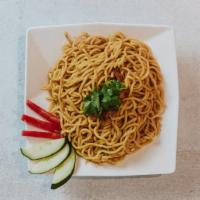 Garlic Noodles · Fresh Egg Noodles tossed in our house special garlic butter sauce, topped with scallion bulb...