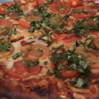 Margherita · house red sauce, fresh basil, sliced roma tomatoes, & five cheese blend
