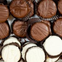 Oreos · Dipped in milk chocolate and drizzled with dark chocolate.