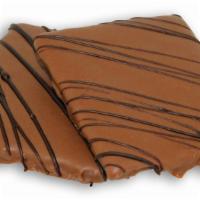 Graham Crackers · Dipped in milk chocolate and drizzled with dark chocolate.