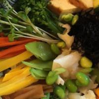 Cha-Ya Delight · Seasoned organic brown rice topped with carrots, kabocha, broccoli, cauliflower, lotus roots...