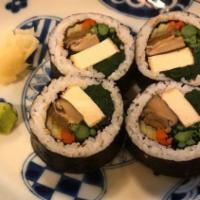 Vegan Roll · A large roll with spinach, atsuage tofu, cucumber, broccolini, pickled burdock, seasoned shi...