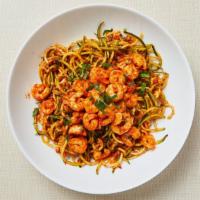 Paleo Shrimp Marinara Zoodle · Pan roasted zucchini noodles served with homemade tomato sauce and spicy garlic shrimp. Glut...