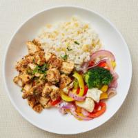 Paleo Chicken Rice Bowl · Cauliflower rice, cilantro-lime marinated chicken and roasted seasonal vegetables (bell pepp...
