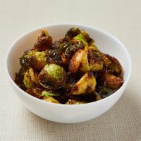 Crispy Brussels Sprouts · Deep fried Brussels sprouts served with almond bitchin sauce. Gluten-free. Vegan.