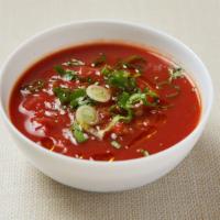 Salsa · Homemade tomato based spicy sauce with onion, jalapeno, serrano, cilantro and lime. Served w...