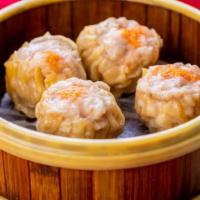 Pork & Shrimp Dumplings 烧麦 · Freshly steamed shrimp with pork filling wrapped together in a thin wonton dough