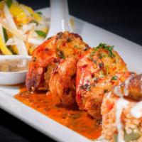 Camarones a la Diabla · Perfectly seasoned Grilled Spicy shrimp, served with a side of rice, refried beans, a side s...