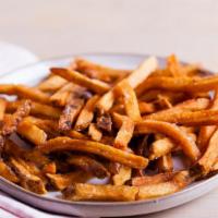 Thick-Cut Fries · Fresh hand thick-cut potatoes deep-fried to perfection.