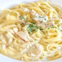 Linguini Alfredo · With our cream sauce, touch of parmesan and savory spice.