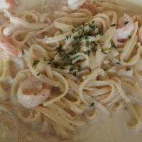 Linguini Shrimp Alfredo · Succulent bay shrimp and a delicious, creamy Alfredo sauce tossed with noodles and a touch o...