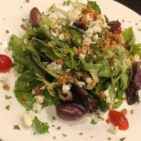 Mista · Vegetarian, gluten-free. Mixed greens with blue cheese and candied walnuts in a balsamic vin...
