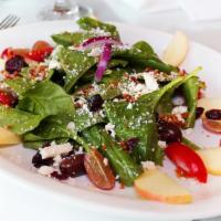 Spinach · Vegetarian, gluten-free. Baby spinach, candied walnuts, apples, grapes, and feta cheese in a...