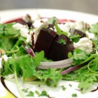 Beet · Vegetarian, gluten-free. Roasted beets with goat cheese and candied walnuts in a honey musta...