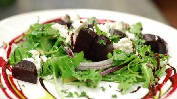 Beet · Vegetarian, gluten-free. Roasted beets with goat cheese and candied walnuts in a honey mustard dressing.