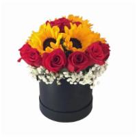 Sunflowers and Roses in a Box · Sunflowers and roses in a box.