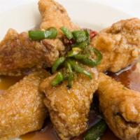 Spicy Garlic Honey Wings · Spicy. Honey glazed with garlic and jalapenos.