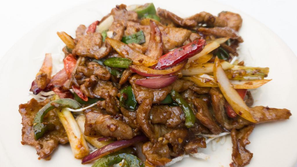 Mongolian Beef  · Spicy with onions in a sweet-spicy garlic bean paste