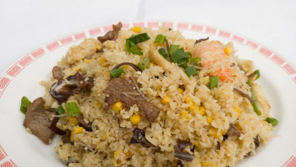 Big Boss Fried Rice · Chicken, shrimp, pork, wood ear mushrooms, and silk noodle. Tossed with egg, corn, and green onions.