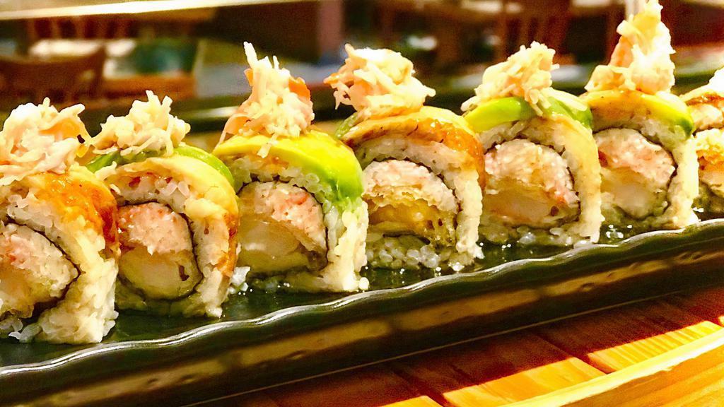 Dragon Roll (8 pc) · Shrimp Tempura, Crab Salad, topped with grilled Eel, avocado & Unagi sauce.