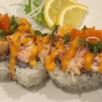 Baked Scallop Roll (8 pc) · Inside: Crab & avocado; Top: Scallops, spicy house sauce, little crab, Unagi sauce, Tobiko, ...