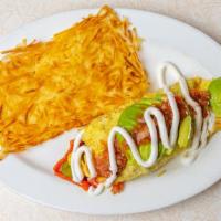 Mexican #2 Omelet · Chorizo, onion, mushroom, and cheddar cheese topped with avocado and sour cream.