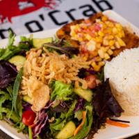 Cajun Fish · Topped with mango salsa, rice, and salad on the side.
