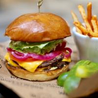 The Westwood Burger · Double patty house blend beef, cooked true, panorama brioche bun, American cheese, sweet pic...