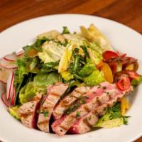Seared Tuna Salad · 8oz pan seared ahi tuna, baby spring mixed greens, cherry tomatoes, artichoke hearts, arugul...