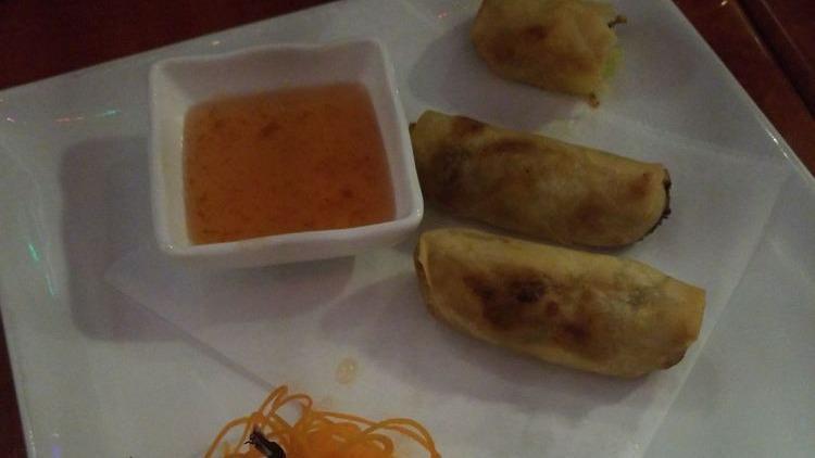 Spring Roll · Stuffed with glass noodle, cabbage, carrot, and celery. Served with plum dipping sauce.