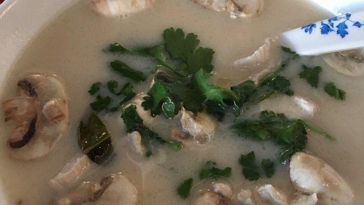 Tom Yum Soup · Spicy. Mushroom, cilantro, and scallion in spicy lemongrass chili paste broth.