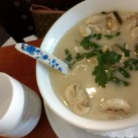 18. Tom Kha Soup · A tasty soup with chili paste, carrots, coconut milk, mushrooms, lemongrass, galangal, kaffi...