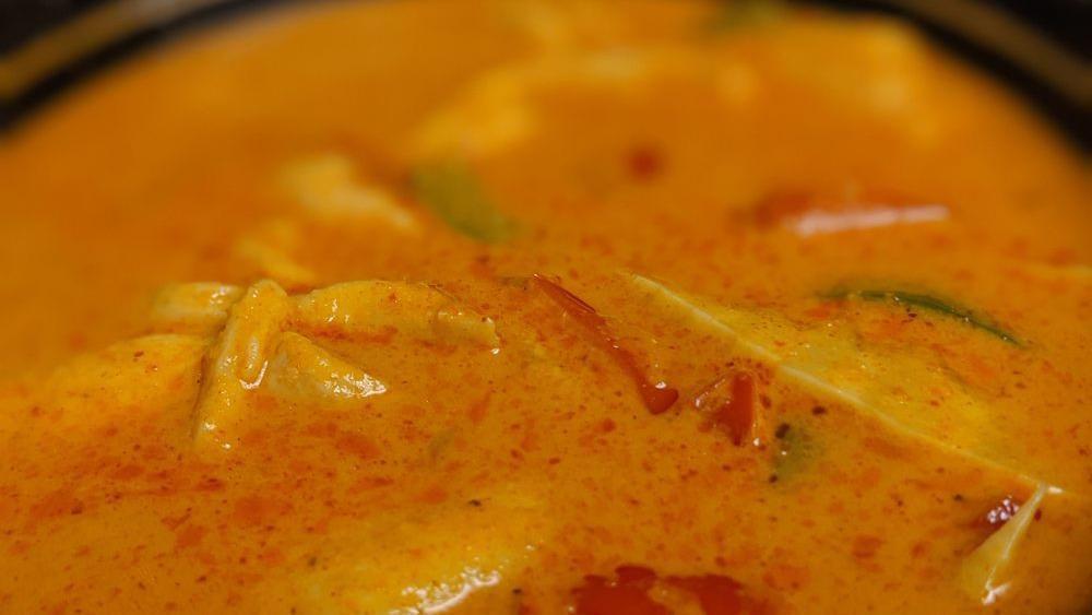 Red Curry · Spicy. Bamboo shoot, basil, and bell pepper in coconut milk with red curry paste.