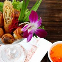 Crispy Spring Rolls (4 Pieces) · Silver noodles, dried mushroom and cabbage served with sweet and sour sauce.