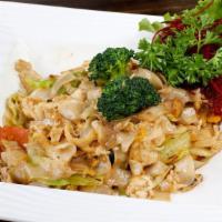 Pad See Ew · Pan fried noodles with egg, cabbage, carrot, and broccoli.