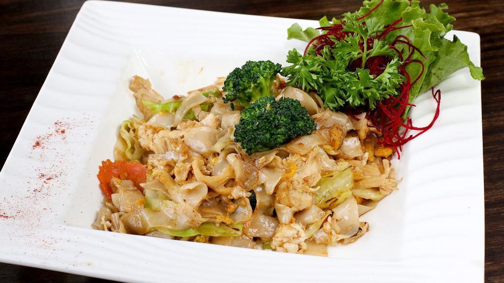 Pad See Ew · Pan fried noodles with egg, cabbage, carrot, and broccoli.